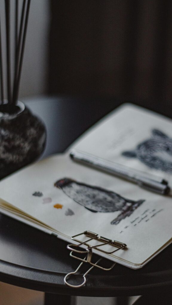 Minimalist Artist Sketchbook and Stationary Desk Aesthetic Wallpaper
