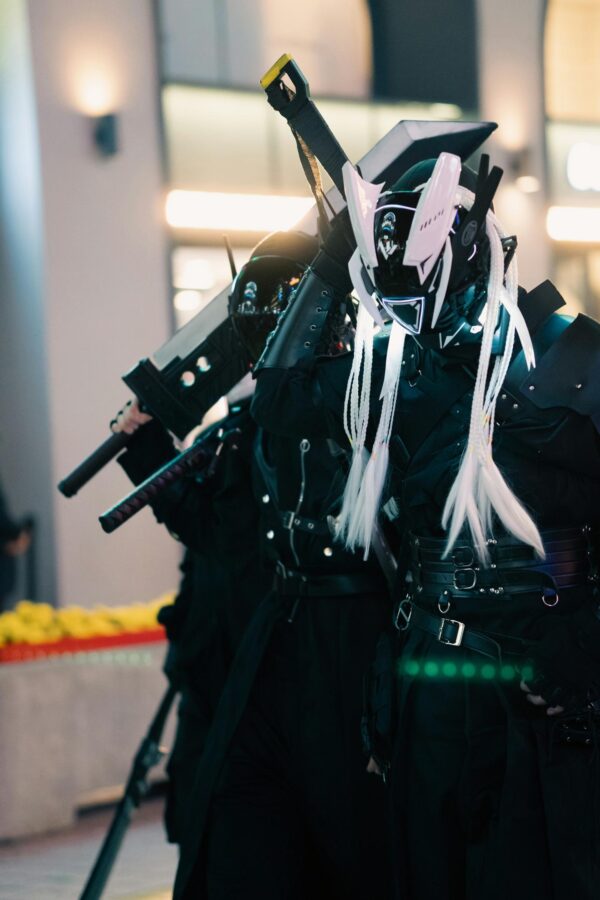 Cyberpunk Cosplay Warriors with Futuristic Swords Mobile Wallpaper