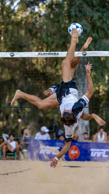 Athletic Footvolley Player Aerial Kick Action Mobile Wallpaper
