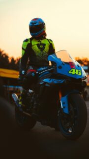 Valentino Rossi Tribute Sportbike Rider at Sunset Phone Wallpaper