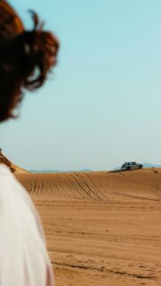 Lone 4×4 Off-Road Adventure on Golden Desert Sand Dunes Wallpaper
