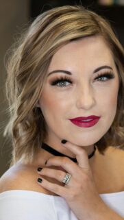 Beautiful Woman with Red Lipstick and Glamorous Makeup Phone Wallpaper