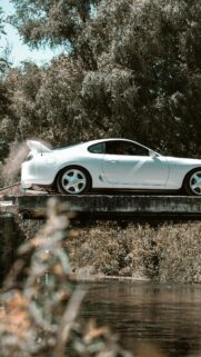 White Toyota Supra on Bridge Scenic Nature Mobile Wallpaper