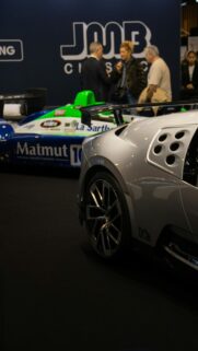Stunning Silver Supercar and Racing Prototype Display Wallpaper