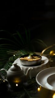 Gourmet Appetizer in Candlelit Setting Phone Wallpaper