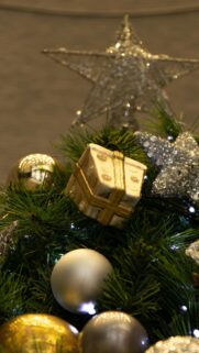 Golden Christmas Gift and Sparkling Ornaments Festive Phone Wallpaper