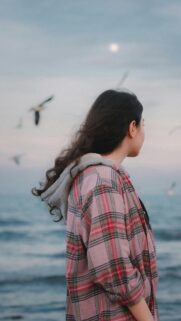 Dreamy Girl in Plaid Shirt by the Sea Aesthetic Phone Wallpaper