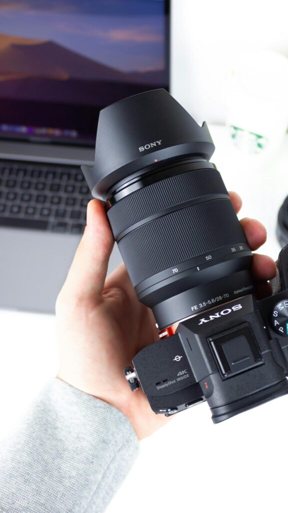 Professional Sony Alpha Camera and Zoom Lens Close-up Mobile Wallpaper