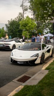 Stunning White McLaren Supercar at Car Show Mobile Wallpaper
