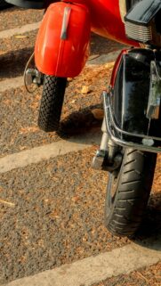 Vespa Scooter Front Tire Close-Up Stylish Urban Mobile Wallpaper