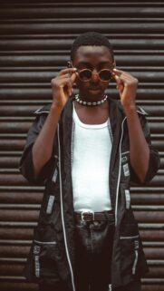 Stylish African Youth in Modern Urban Fashion 4K Mobile Wallpaper