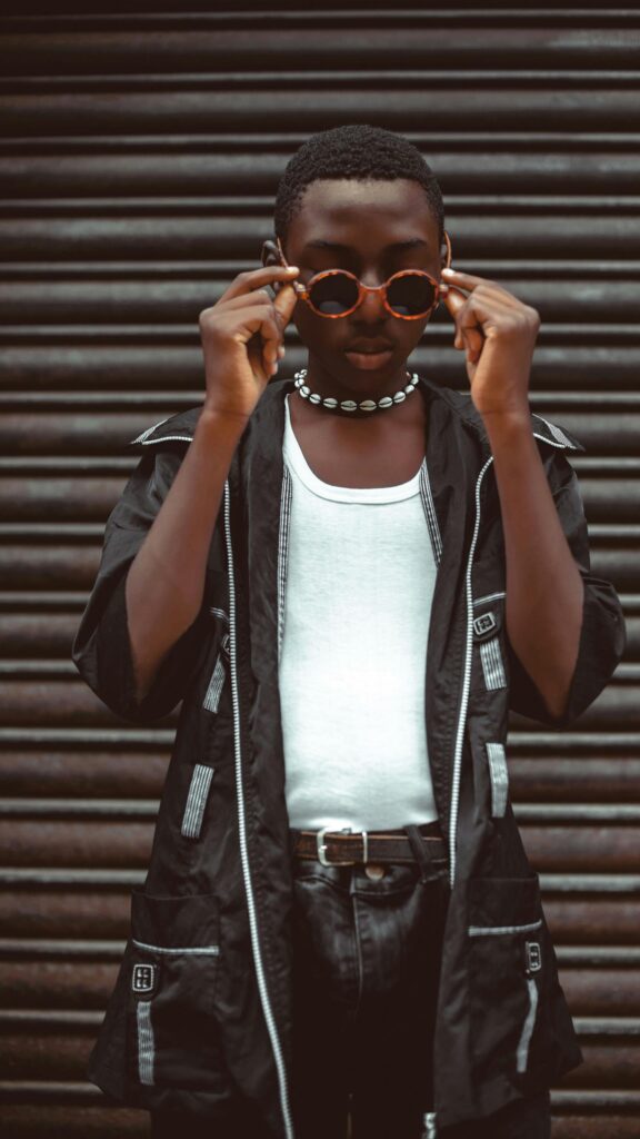 Stylish African Youth in Modern Urban Fashion 4K Mobile Wallpaper