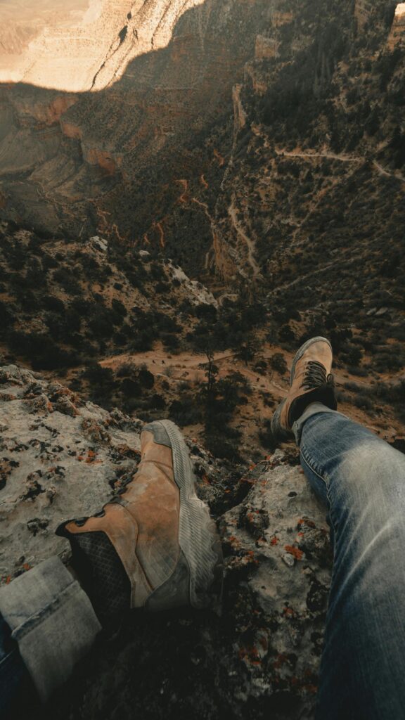 Grand Canyon Edge Adventure Hiking Boots First Person View Wallpaper