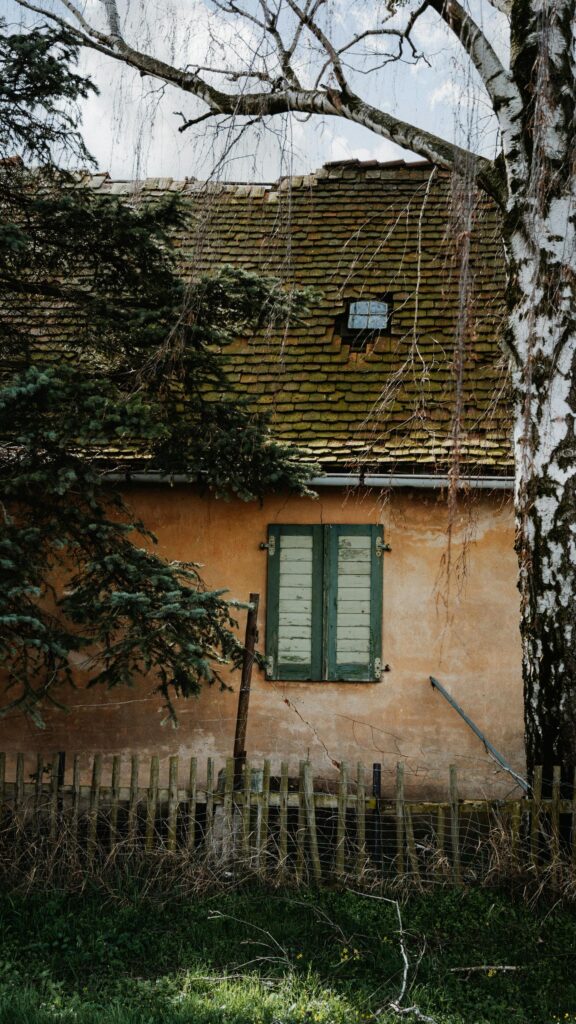 Rustic Countryside Cottage with Green Shutters Mobile Wallpaper