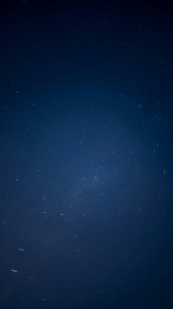 Celestial Star Trails Energy for Cosmic Manifestation Spiritual Wallpaper