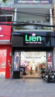 Vibrant Boutique Shopfront Exterior Urban Street Style Mobile Wallpaper