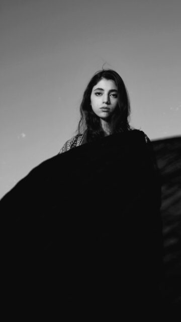 Mysterious Portrait of a Girl in Monochrome Dramatic Aesthetic Wallpaper