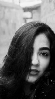 Stunning Portrait of a Woman with Snowflakes Mobile Wallpaper