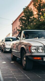 Vintage Silver Mercedes-Benz Roadster Street Side View Wallpaper