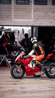 Ducati Racing Team Preparing for Track Day 4K Mobile Wallpaper