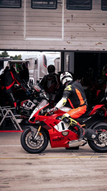 Ducati Racing Team Preparing for Track Day 4K Mobile Wallpaper