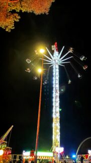Thrilling Night Carnival Swing Ride Mobile Background Wallpaper