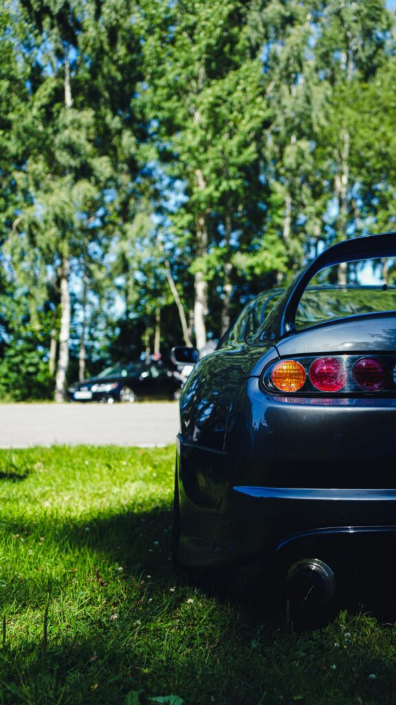 Iconic Toyota Supra MK4 Rear View JDM Sports Car Mobile Wallpaper