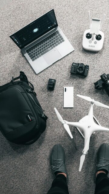 Professional Photographer Gear Flat Lay Aerial Travel Tech Wallpaper