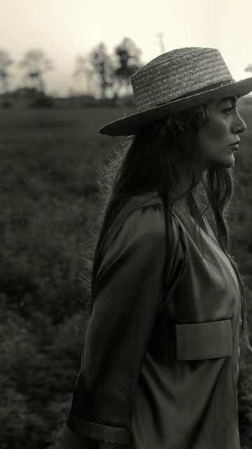 Melancholic Woman in Straw Hat Black and White Aesthetic Phone Wallpaper