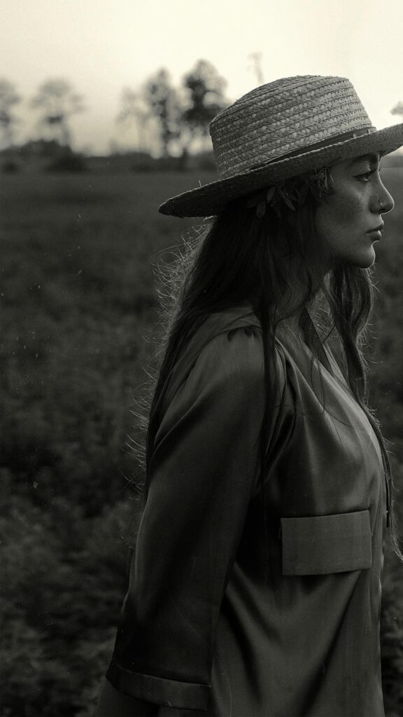 Melancholic Woman in Straw Hat Black and White Aesthetic Phone Wallpaper
