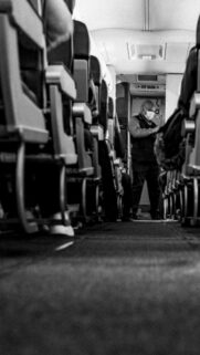 Moody Black and White Airplane Aisle Travel Mobile Wallpaper