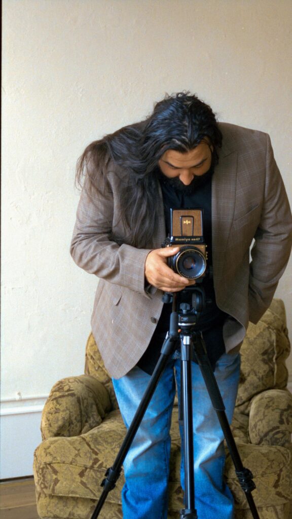 Man with Vintage Mamiya RB67 Camera Aesthetic Mobile Wallpaper