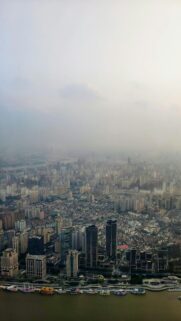 Stunning Aerial View of Shanghai City Skyline with Huangpu River Wallpaper