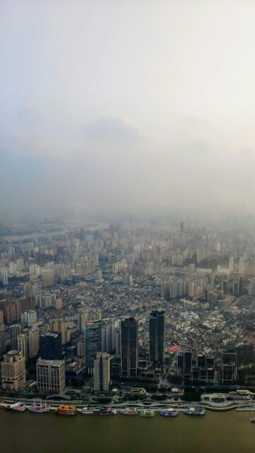 Stunning Aerial View of Shanghai City Skyline with Huangpu River Wallpaper