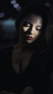 Elegant Woman in Dark Moody Portrait Free Mobile Wallpaper