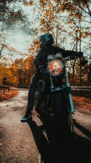 Autumn Biker Journey on a Classic Motorcycle Mobile Wallpaper