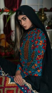 Stunning Woman in Traditional Ethnic Embroidered Shirt Mobile Wallpaper