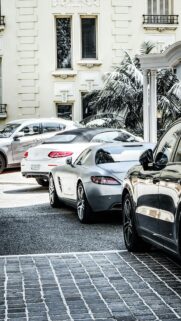 Luxury Mercedes-Benz Supercars Parked in Elegant European Street Wallpaper