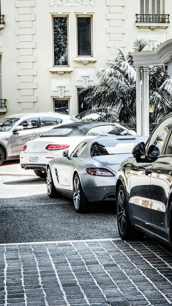 Luxury Mercedes-Benz Supercars Parked in Elegant European Street Wallpaper