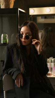Chic Fashionista in Black Blazer and Sunglasses Mobile Wallpaper