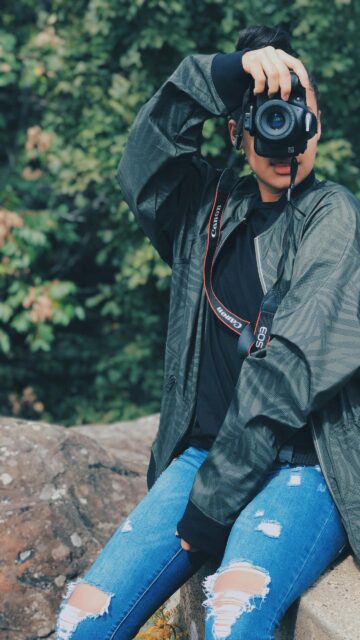 Photographer in Nature Olive Jacket Portrait Mobile Wallpaper