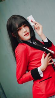 Stunning Anime Cosplay Girl with Red Eyes and Ace Card 4K Wallpaper