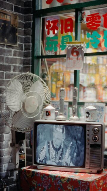 Nostalgic Vintage Chinese Television Room Setup Mobile Wallpaper