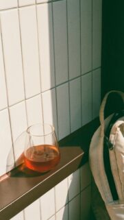 Sunlit Iced Tea Aesthetic on Tiled Wall Phone Wallpaper
