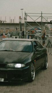 Black Nissan Skyline R33 Sports Car Drift Event Mobile Wallpaper