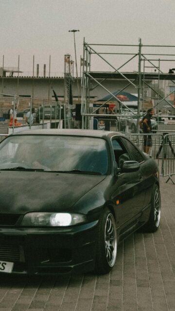 Black Nissan Skyline R33 Sports Car Drift Event Mobile Wallpaper