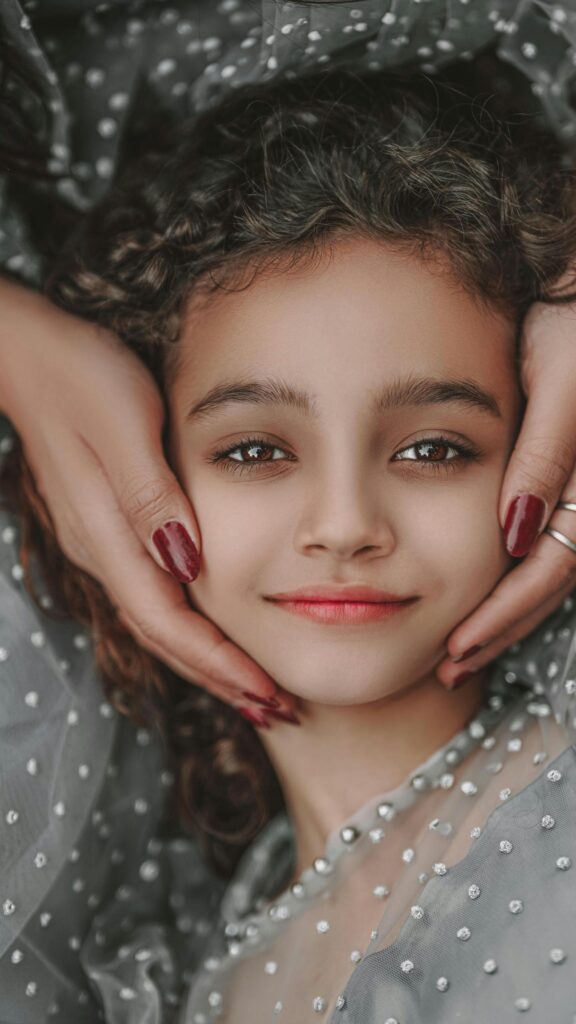 Beautiful Girl with Kind Eyes and Elegant Tulle Portrait Wallpaper