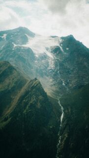 Breathtaking Alpine Mountain Glacier and Flowing Stream Mobile Wallpaper