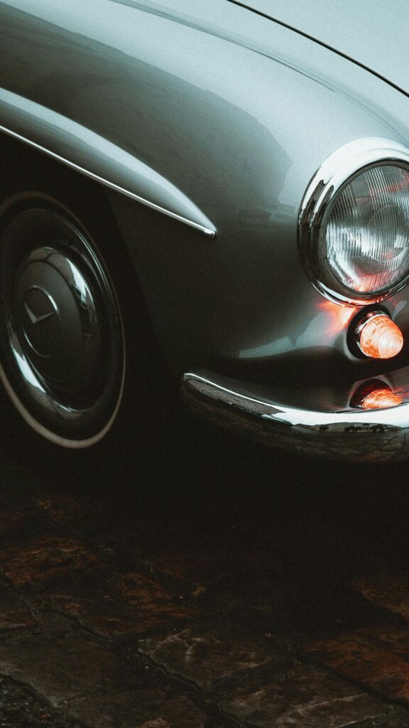 Classic Vintage Silver Car Close-Up Mobile Wallpaper