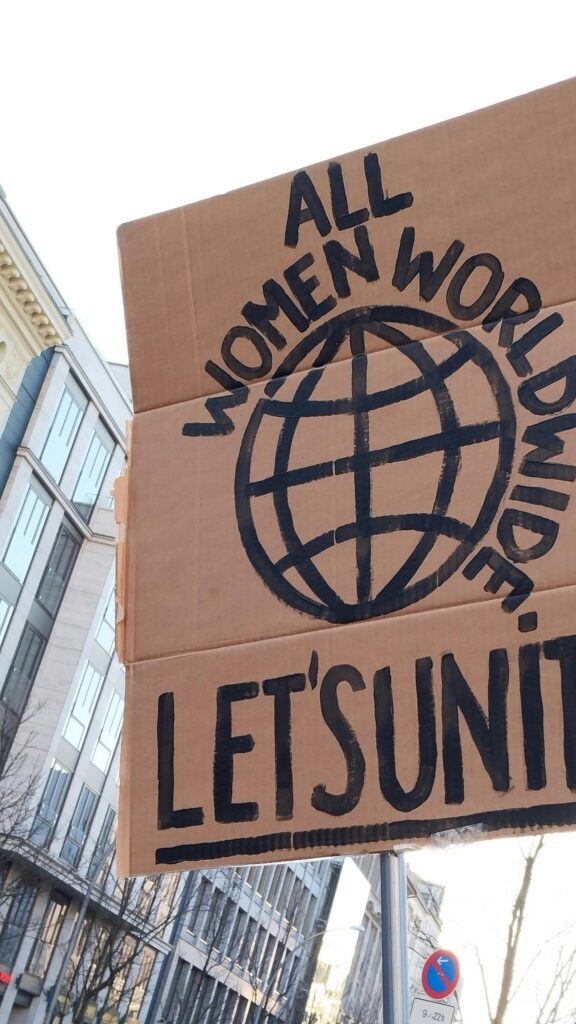 All Women Worldwide Let's Unite Protest Sign Phone Wallpaper